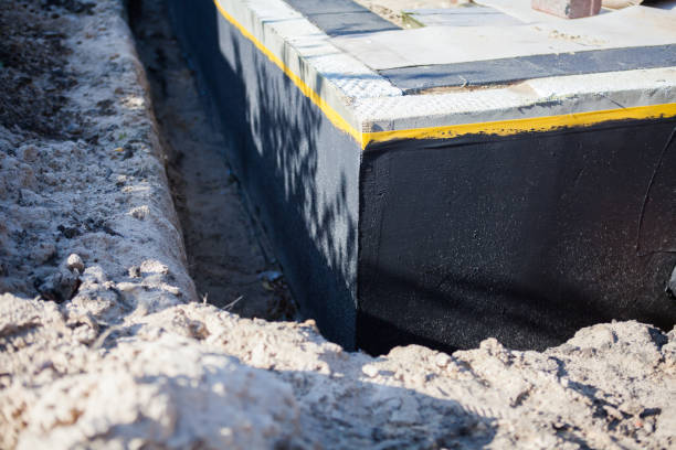 Professional Emergency Waterproofing technician working in Scottsville, NY